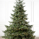 Árvore de Natal European Fir com Galhos Articulados, Suporte Metálico e Micro LEDs Embutidos